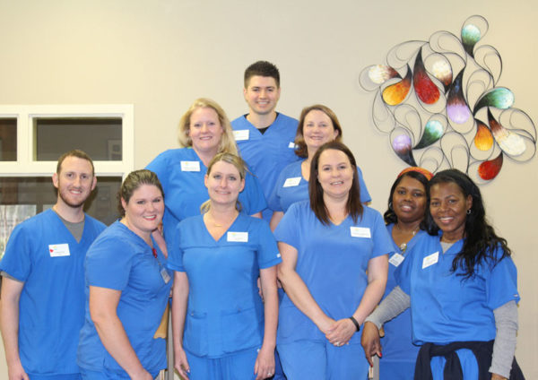 rehab therapy staff posing for picture
